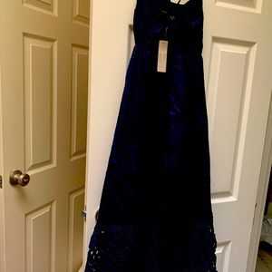 Brand new JCrew maxi dress in Navy and tags still on dress. It is a size XXP